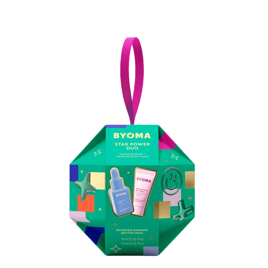 BYOMA Star Power Duo gift set in a green geometric box with pink ribbon and star graphics