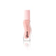 Luxurious pink lip oil in a sculpted glass bottle with creamy, glossy texture
