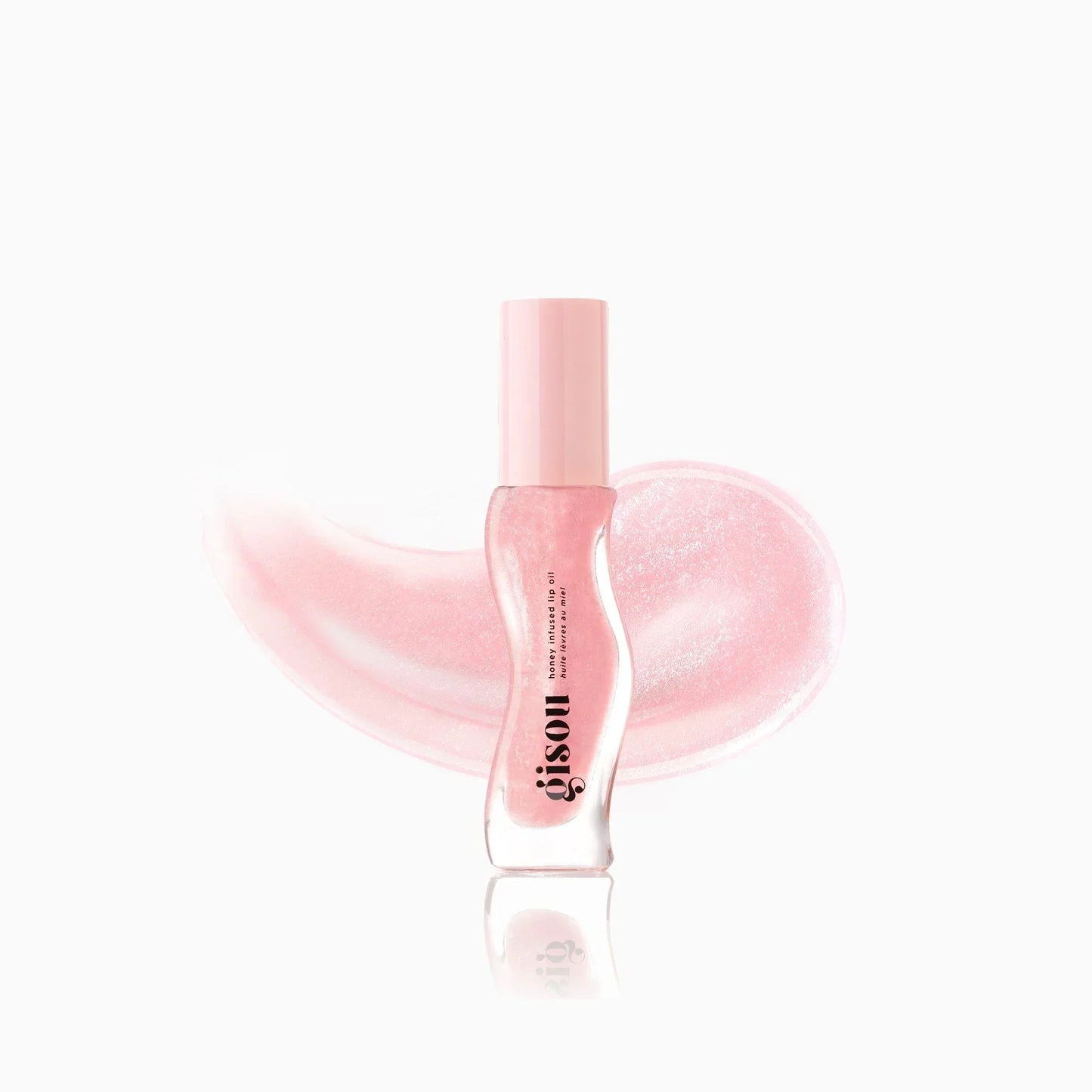 Light pink lip oil with shimmer.