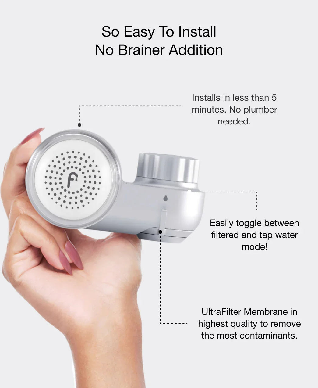 Chrome water filter with ultra-filter membrane, held in hand, features minimalist silver finish, easy no-plumber installation, for Wylde Grey beauty routines.