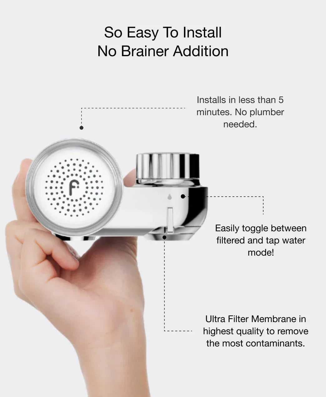 Hand holding a sleek chrome faucet water filter with ultra filter membrane, easy install design, luxury home accessory.