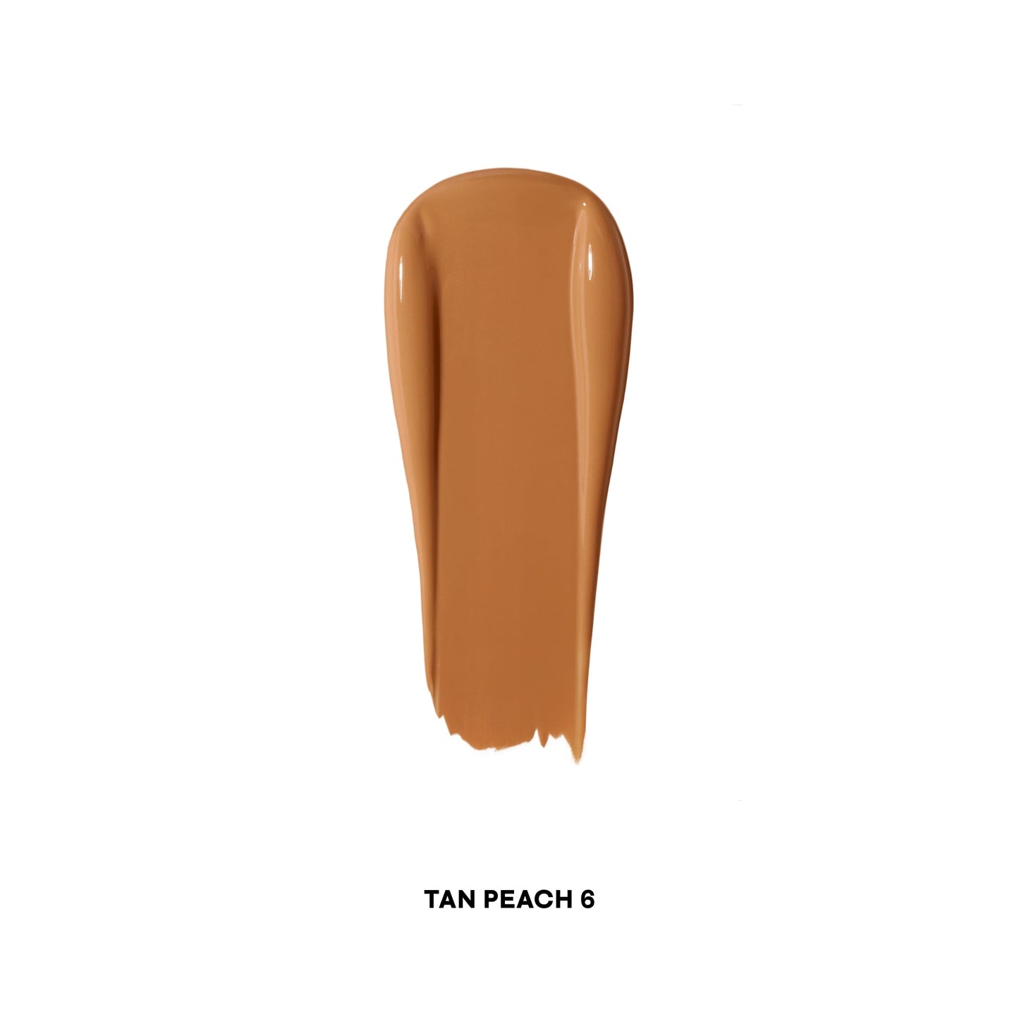 Tan Peach 6 concealer swatch with creamy, radiant texture on white background