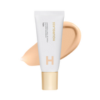 Hourglass Veil hydrating skin tint tube with creamy beige swatch, luxury beauty product