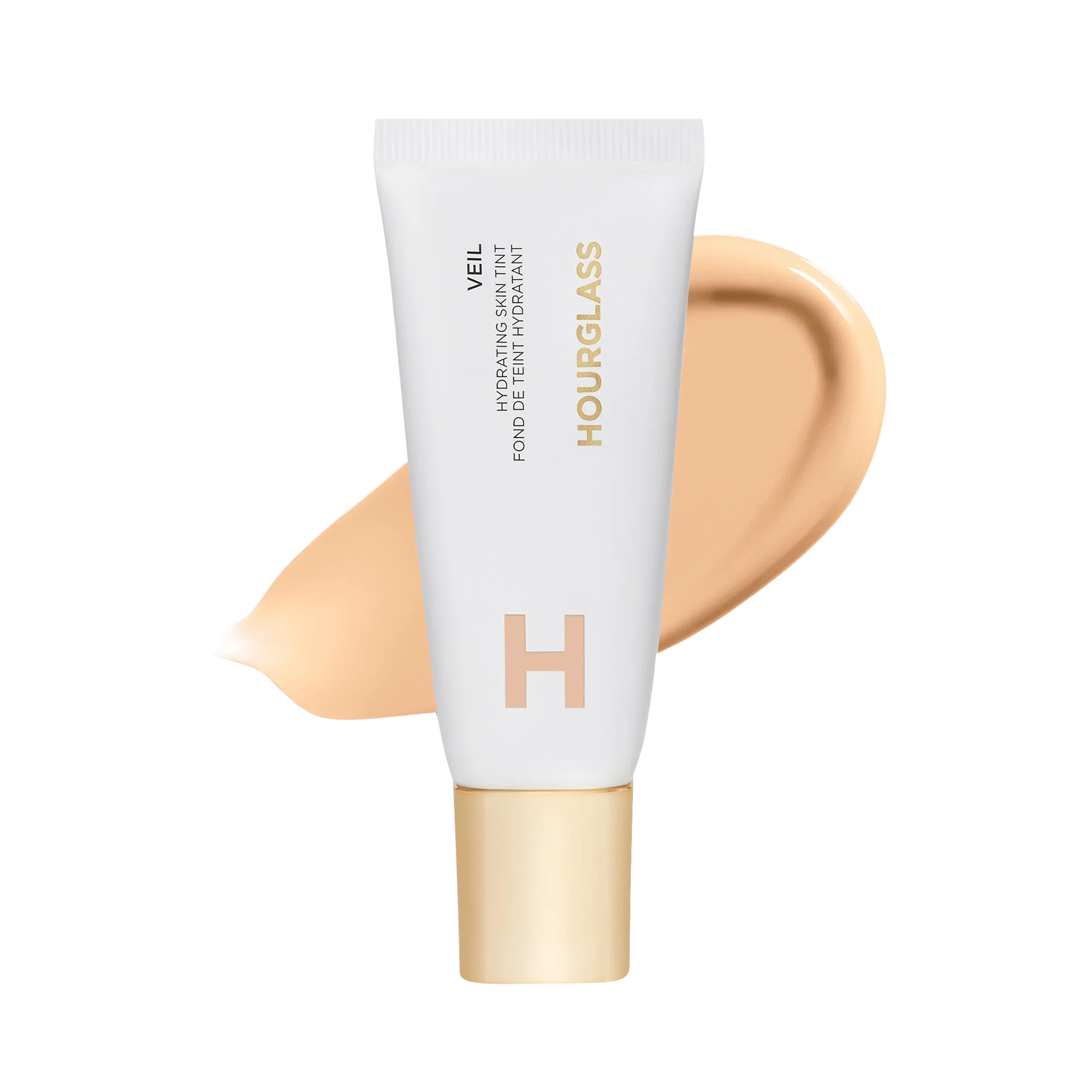 Hourglass Veil hydrating skin tint in sleek white tube with creamy beige swatch, luxury beauty
