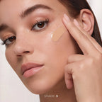 Model applying creamy beige liquid foundation, dewy finish, beauty skincare, Shade 5