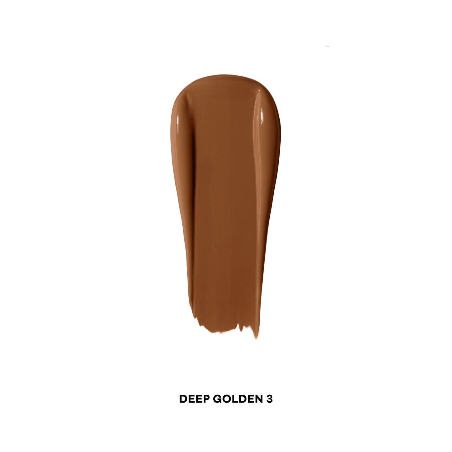 Deep golden concealer swatch with creamy, dewy finish on white background.