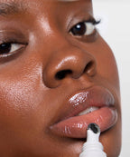 | desc: Model wears Lip Gloss in Clear