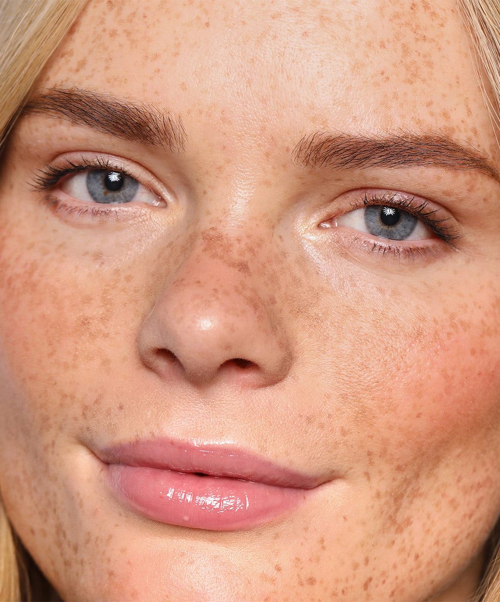 | desc: Sophia wears Lip Gloss in shade Blush