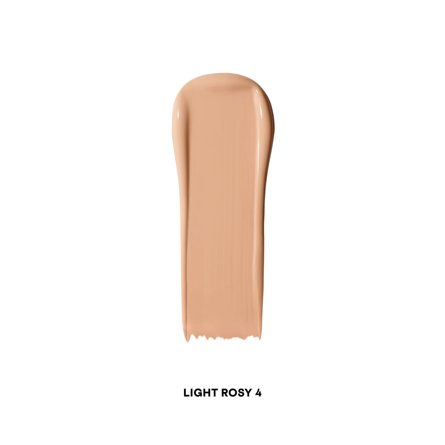 Creamy concealer swatch in light rosy shade with smooth, dewy finish on white background.