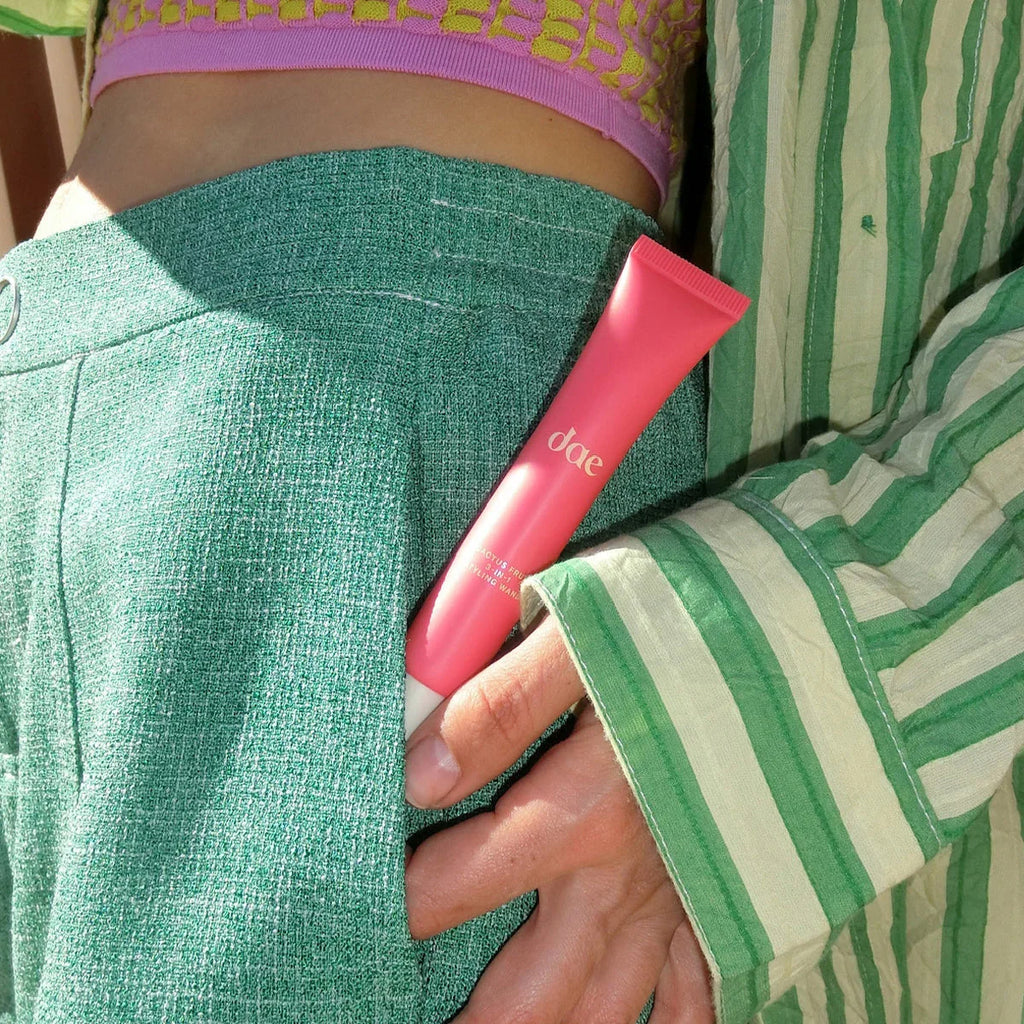 dae pink skincare tube in green pocket, Wylde Grey viral beauty favorites