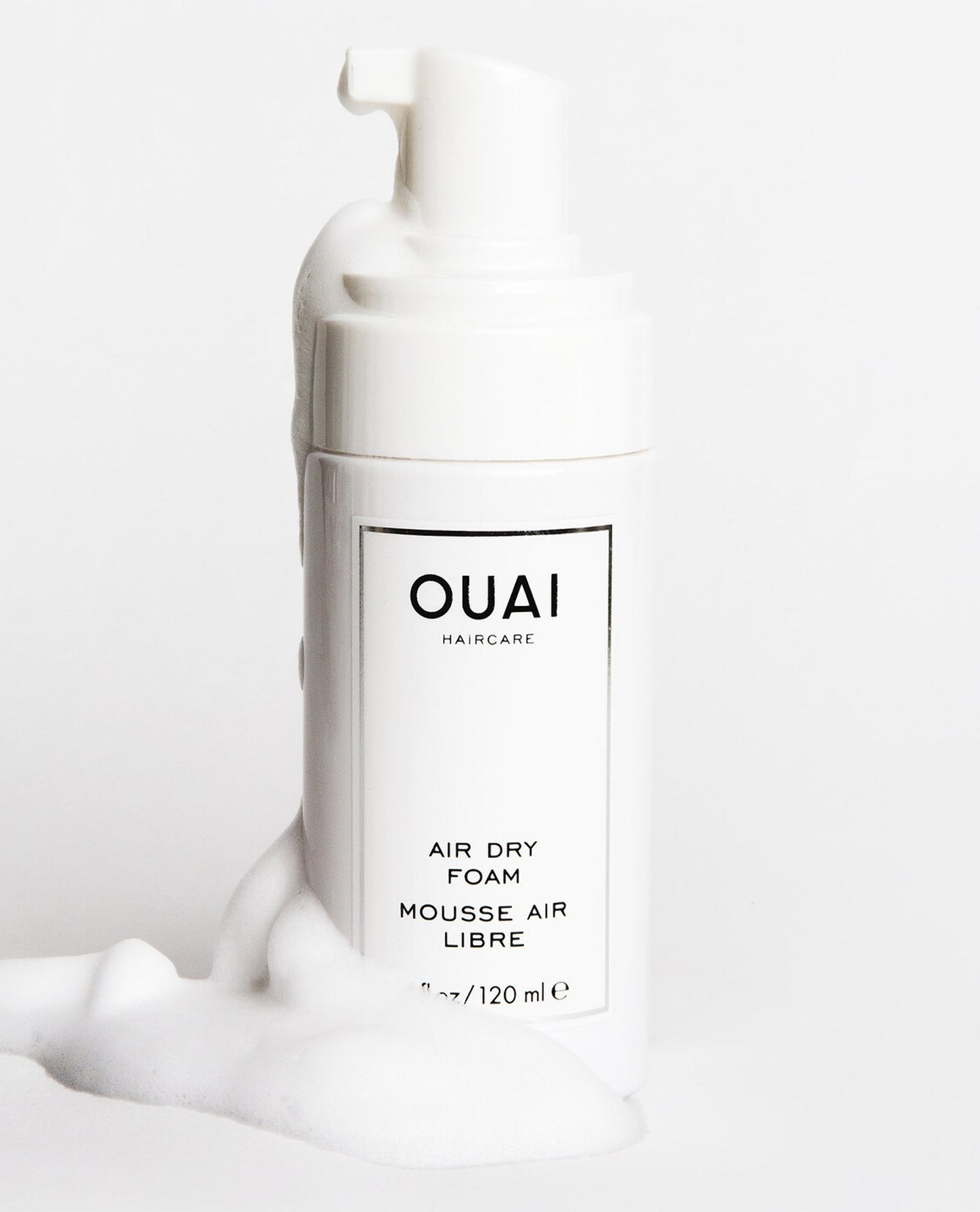 OUAI Haircare Air Dry Foam 120ml bottle surrounded by white foam product.