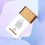 Drunk Elephant D-Bronzi Anti-Pollution Sunshine Drops bottle on pastel abstract background