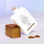 Drunk Elephant D-Bronzi Anti-Pollution Sunshine Drops bottle with bronze cap and drops