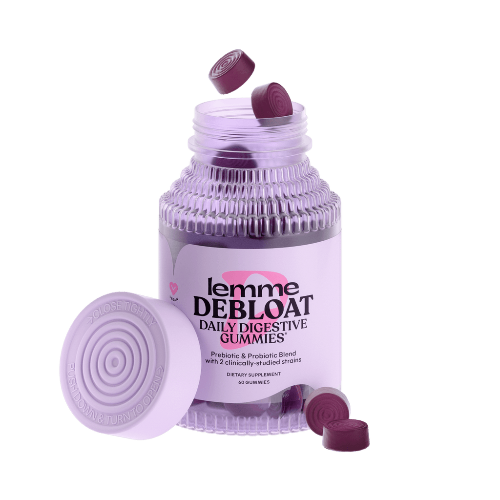 Lemme debloat bottle with lid off. Purple gummies sitting at the base and coming out of the top of the bottle