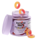 A jar of Lemme Skin Gummy Rings on a white background, with several gummy rings floating above and resting around the open container. The jar is light purple with a matching lid leaning against it, and the label reads 'lemme SKIN FIRM & HYDRATING GUMMY RINGS'.