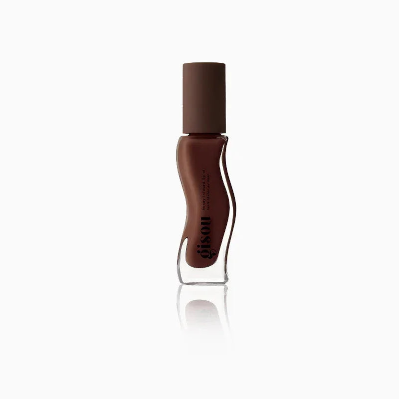 Mocha brown liquid lipstick in a wavy, luxe bottle with matte finish cap on white background