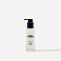 Chris McMillan The Styling Balm in sleek white bottle with black pump, luxury haircare at Wylde Grey