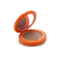 Luxurious cream bronzer in sleek orange compact with mirror, Wylde Grey beauty favorite