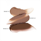 Three creamy foundation swatches in light, medium, and deep shades on white background