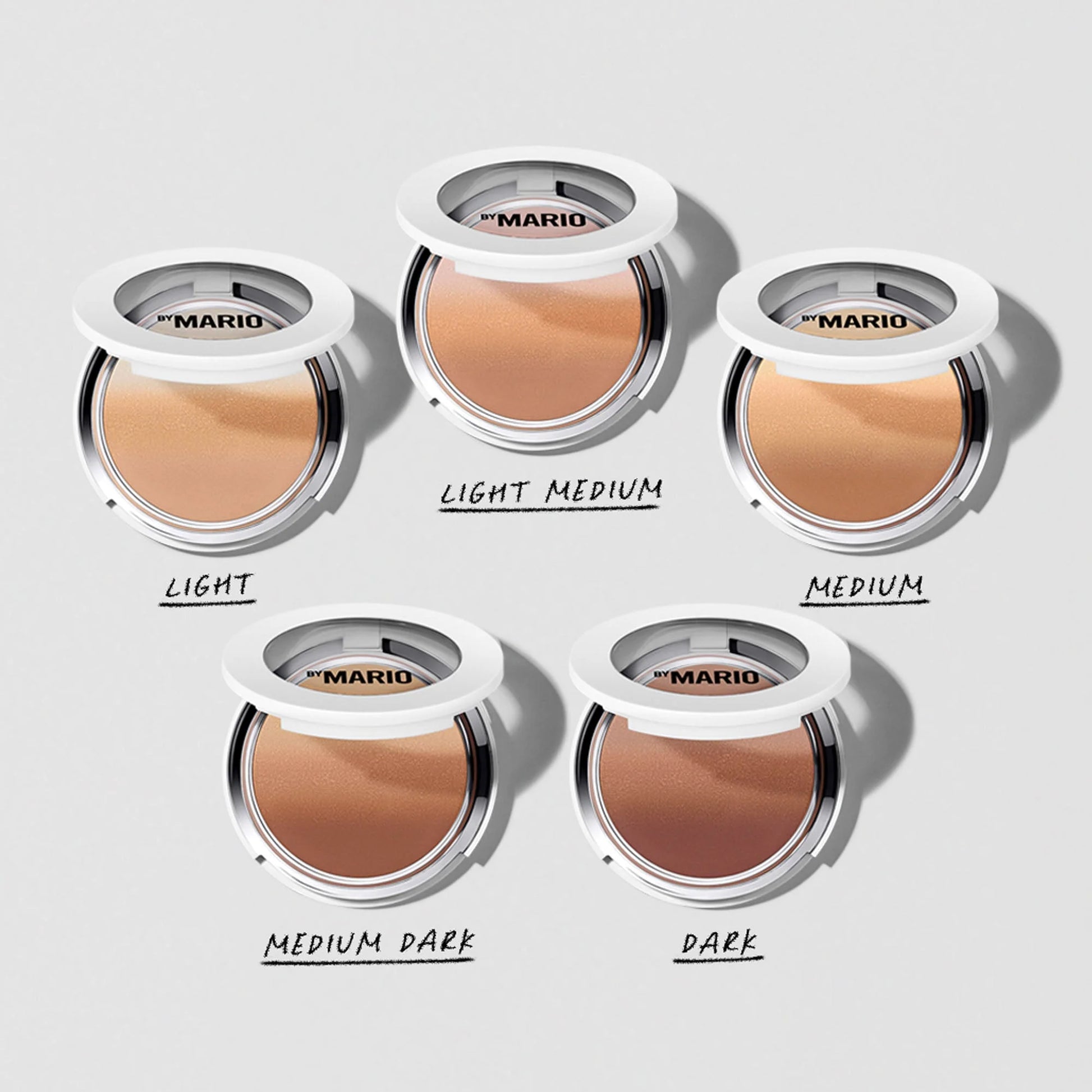 Luxe pressed powder compacts in light to dark shades, featuring silky matte textures.