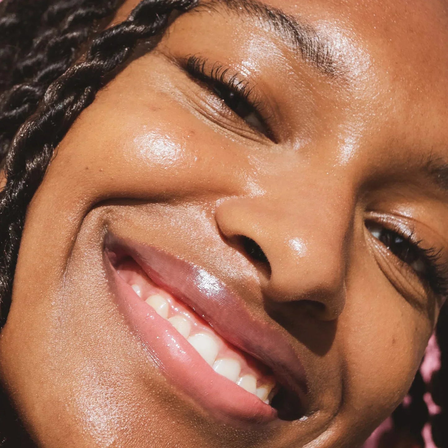 A model wearing the Tower 28 Beauty ShineOn Lip Jelly in the shade Pistachio on her lips. [Pistachio]
