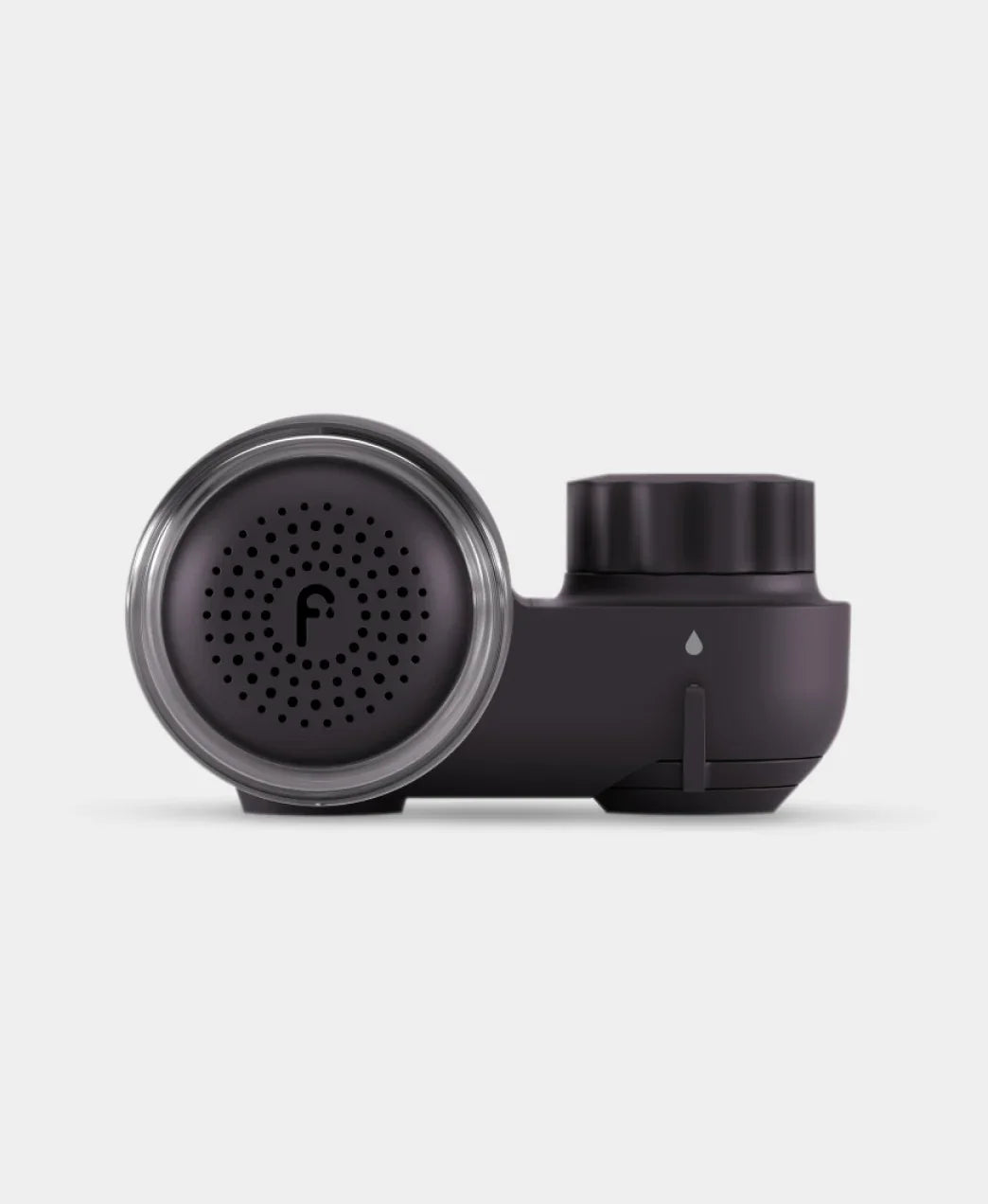 Sleek matte black skincare beauty device with circular detailing, luxury finish, Wylde Grey