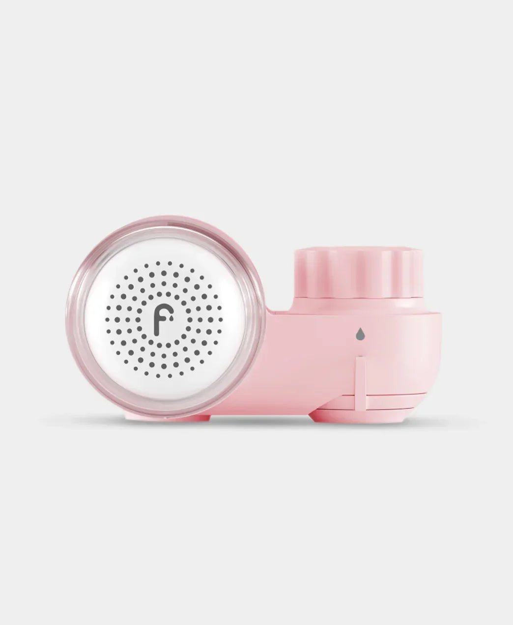 Luxury pale pink skincare facial cleansing brush with sleek design from Wylde Grey