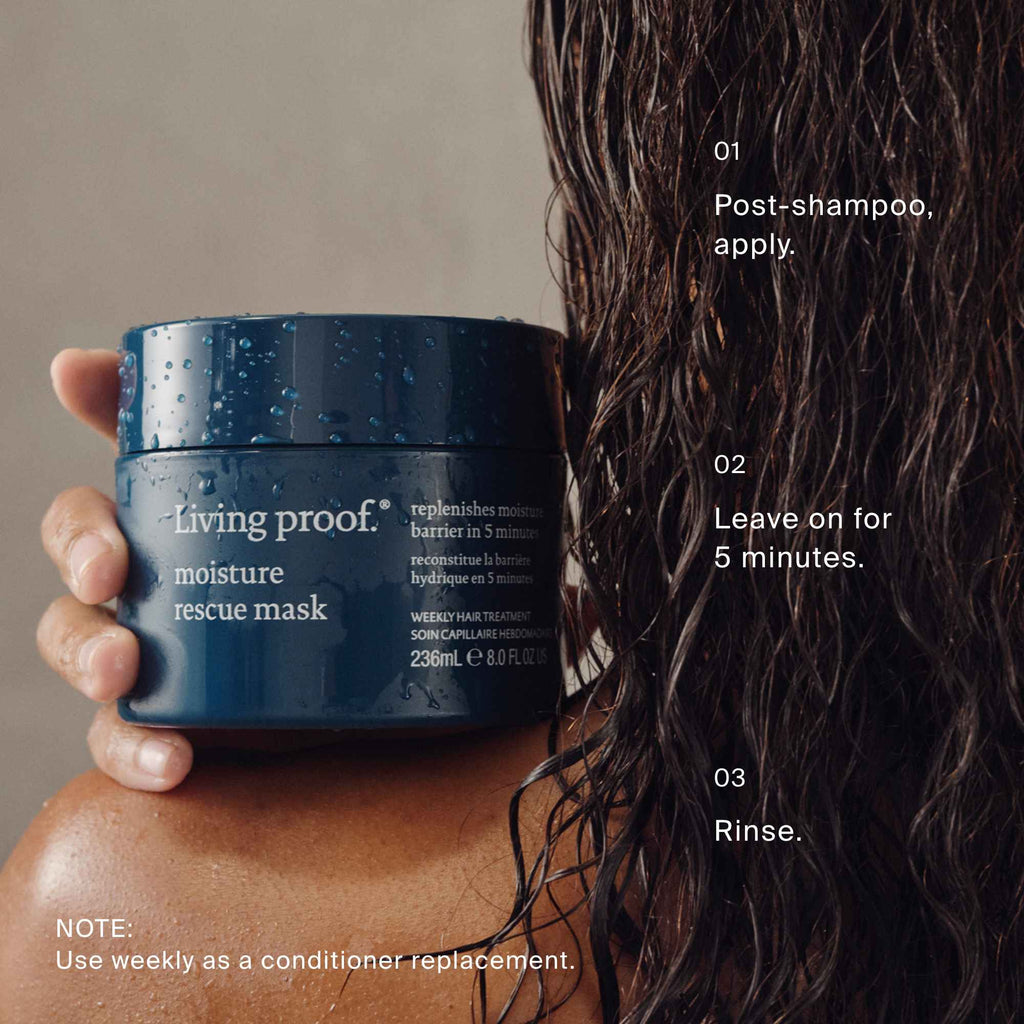 Living Proof moisture rescue mask jar held by a person with wet hair, instructions displayed on the right.