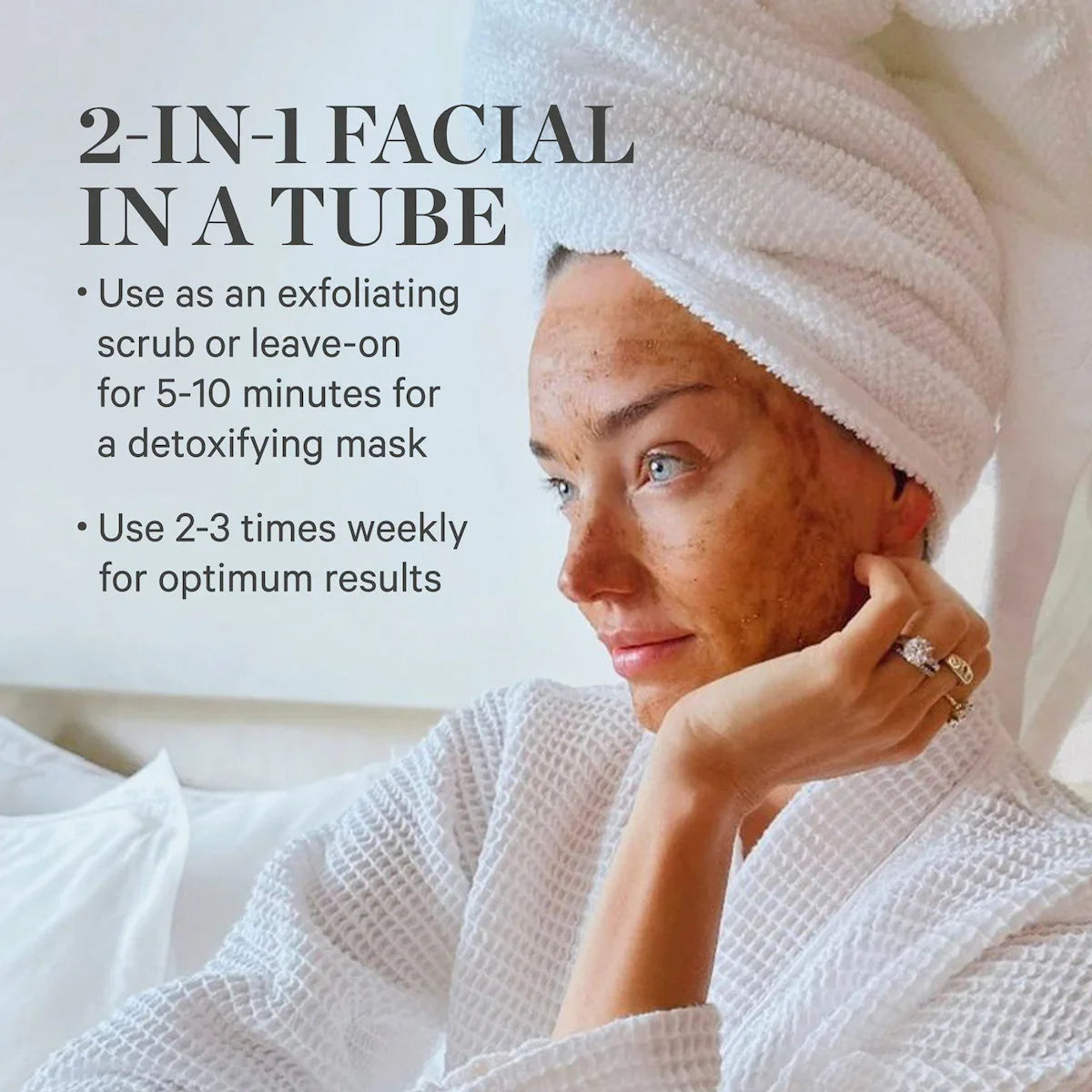 Woman in white robe and towel with exfoliating facial mask, glowing skin, Wylde Grey beauty skincare