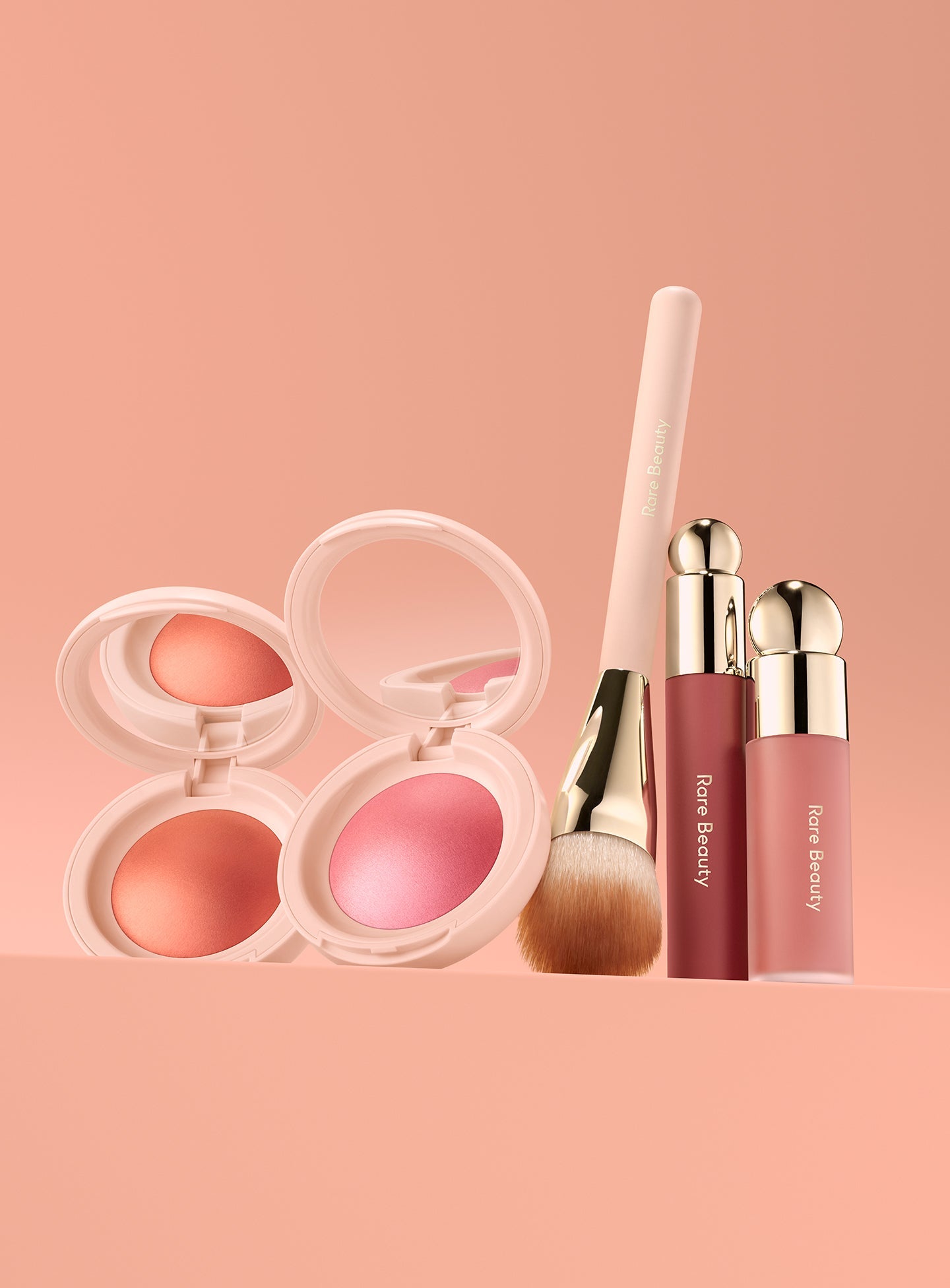 | Rare Beauty's Soft Pinch Collection, including the Soft Pinch Liquid Blush, Soft Pinch Tinted Lip Oil, Soft Pinch Luminous Powder Blush, and Soft Pinch Blush Brush.
