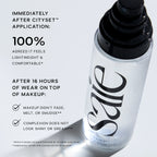 Luxurious Saie CitySet spray bottle with sleek black cap, promoting lightweight, comfortable makeup setting.