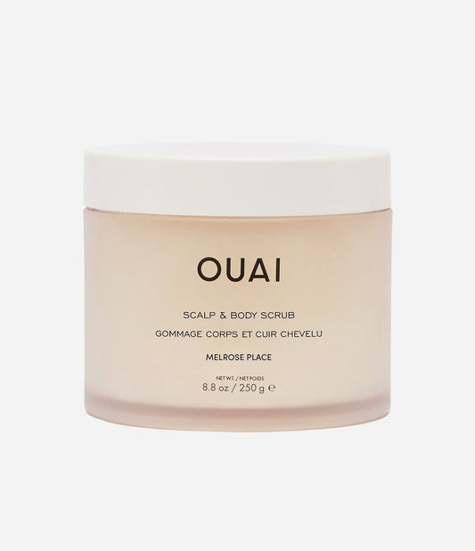 OUAI scalp and body scrub jar on a white background