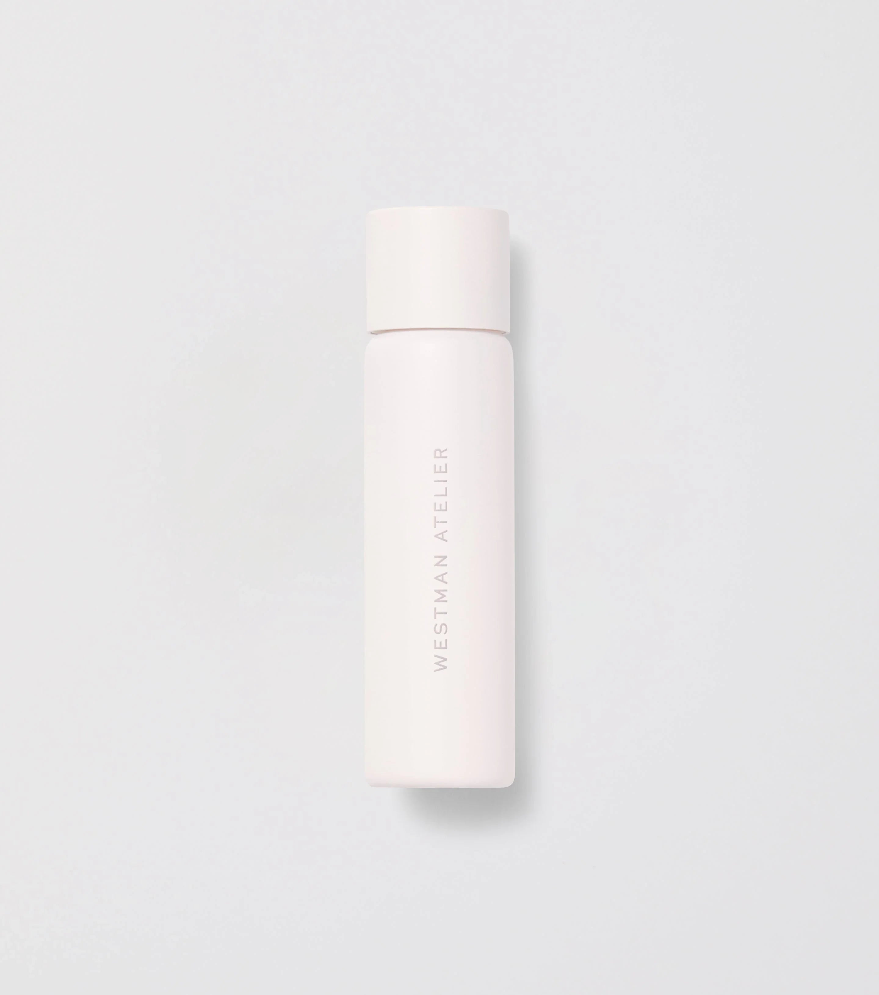 Westman Atelier Skin Activator refill in sleek matte white bottle on light background