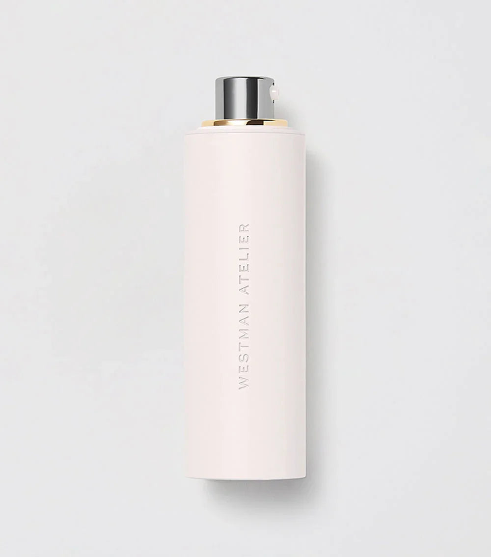 Westman Atelier pale pink luxury skincare bottle with sleek, matte finish on light background