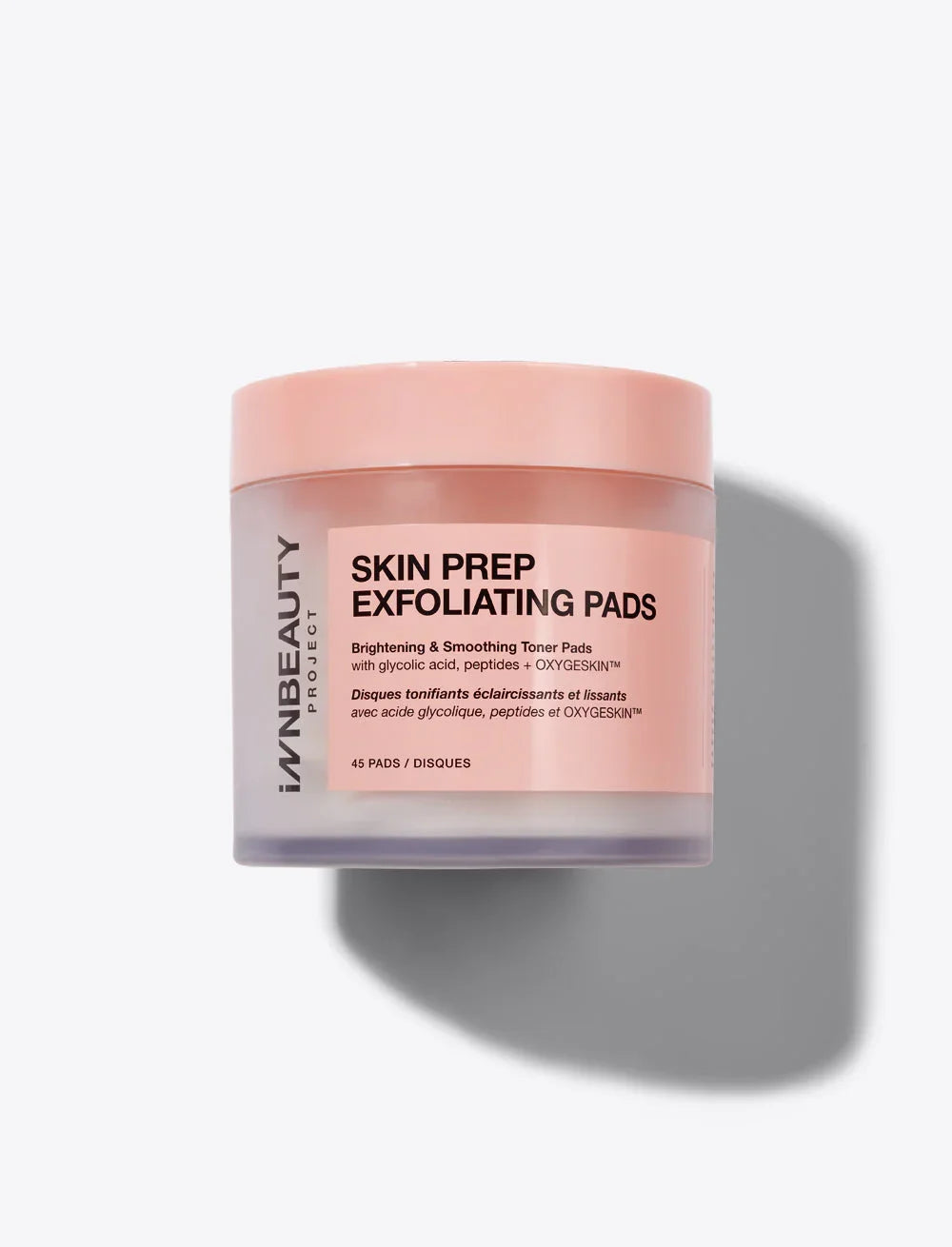 INNBEAUTY PROJECT Skin Prep Exfoliating Pads in a blush pink jar on a white background, luxurious skincare.