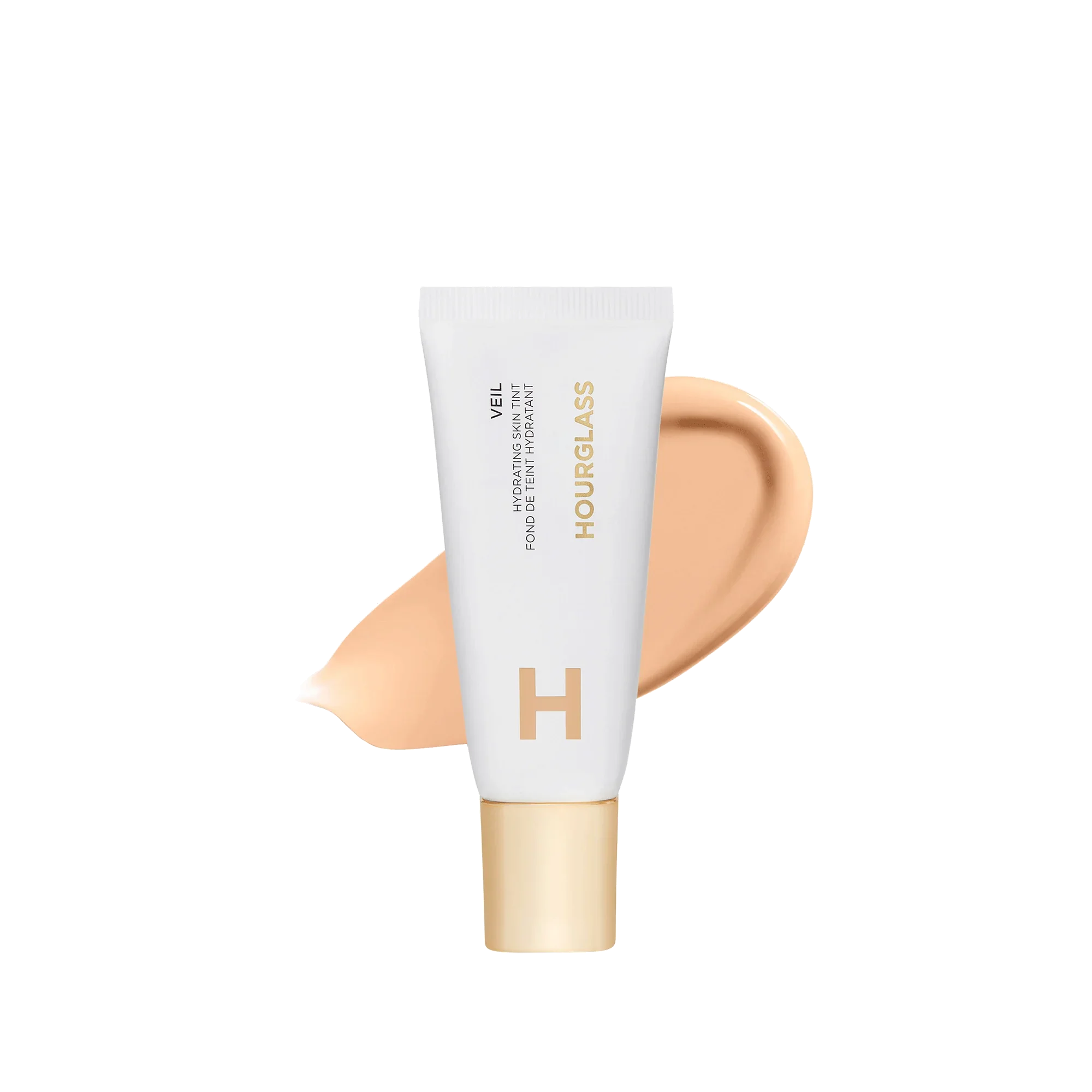 Hourglass Veil hydrating skin tint in soft beige with creamy, dewy finish on white