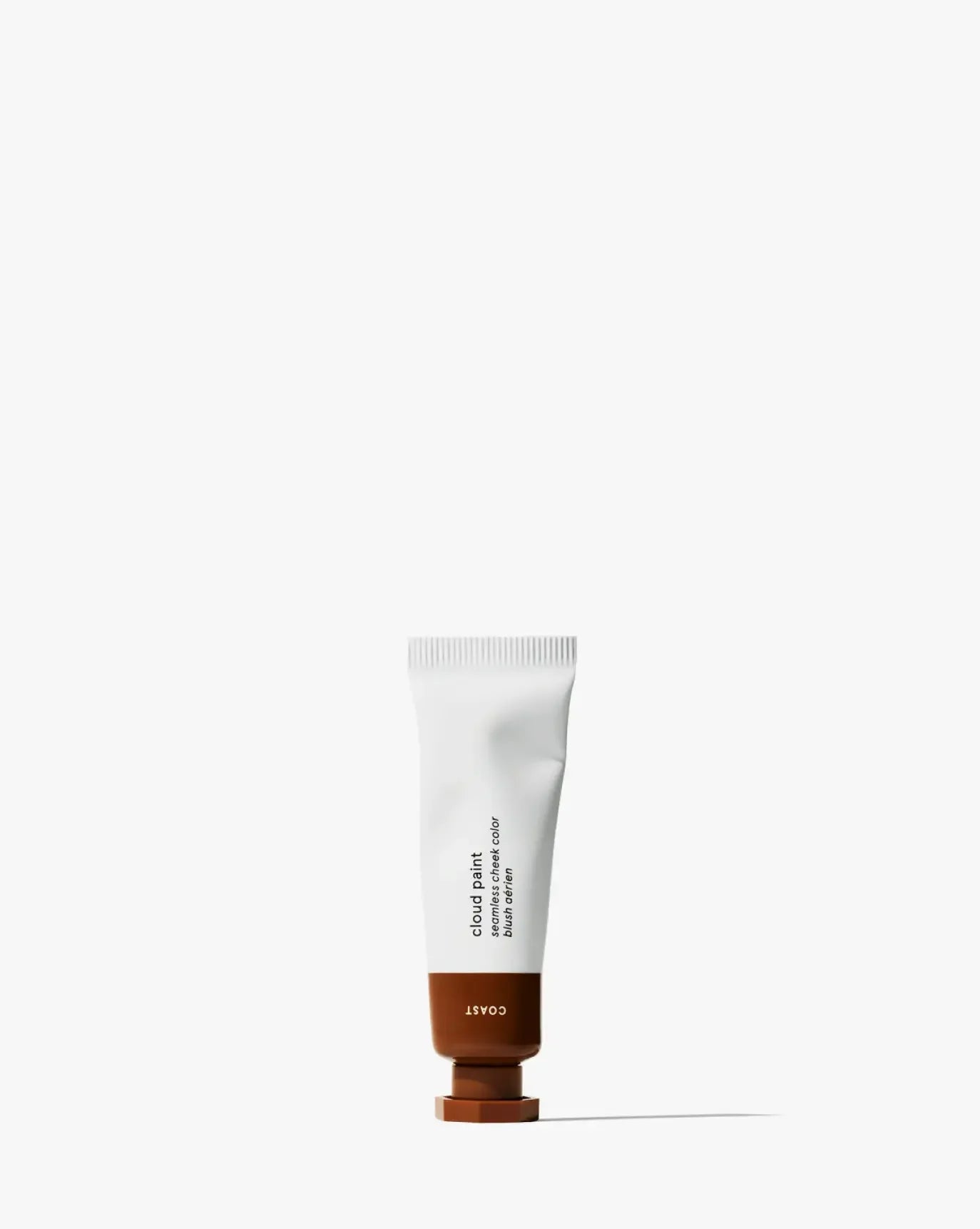 Creamy liquid blush in a chic white and brown tube with a dewy, natural finish.