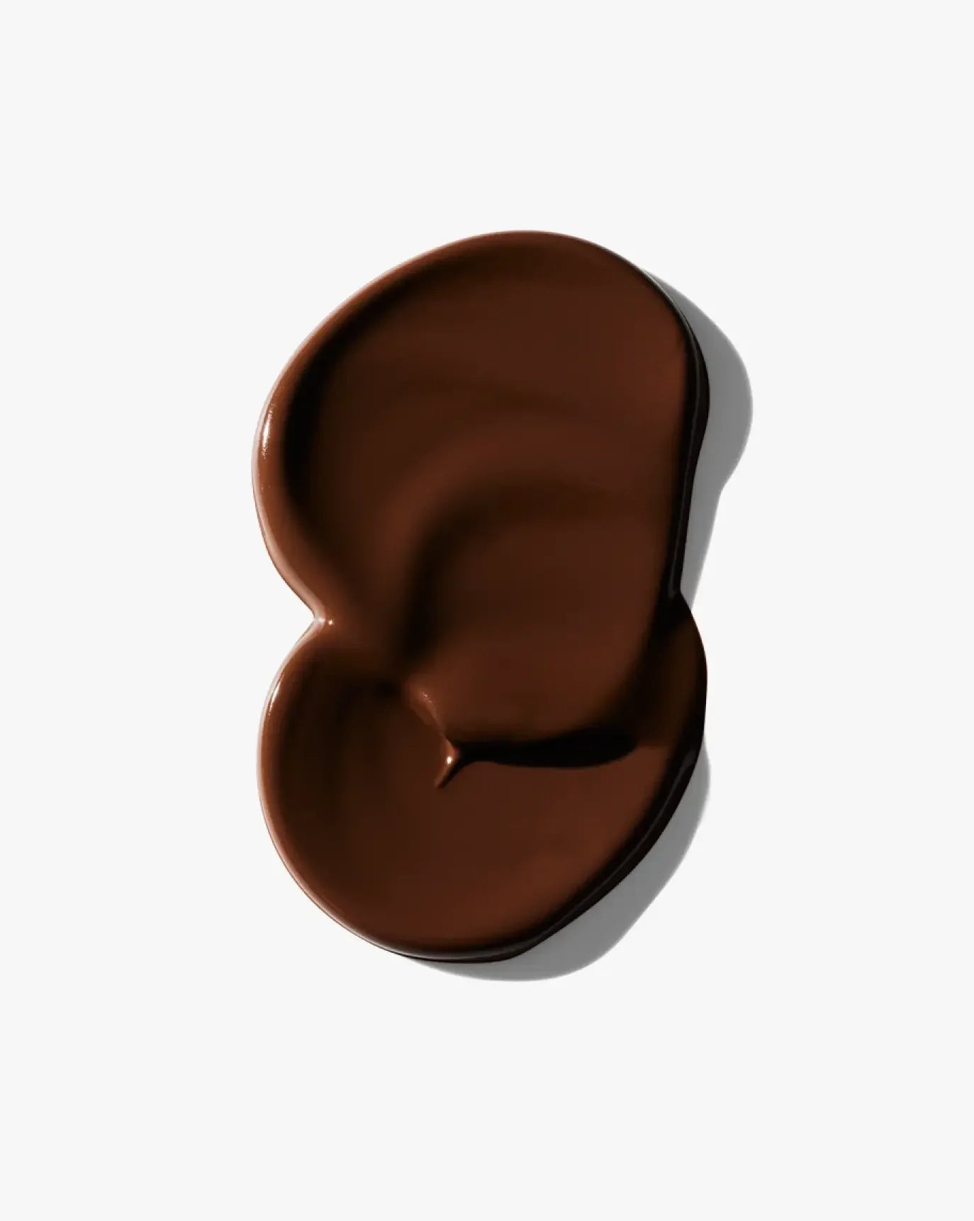 Rich chocolate brown cream blush with a smooth, silky texture on a white background