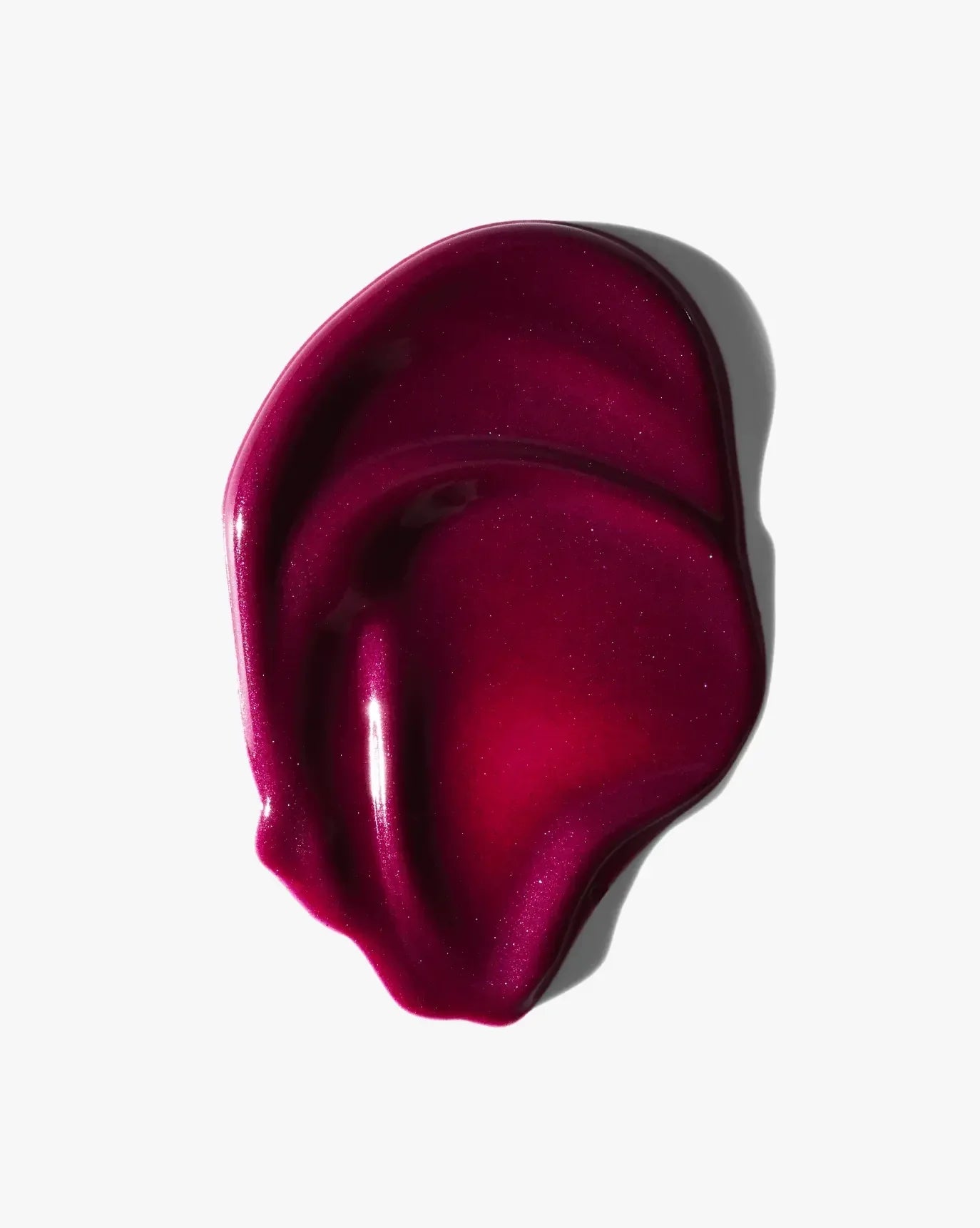 Deep berry cream blush swatch with rich, dewy finish and smooth luxurious texture