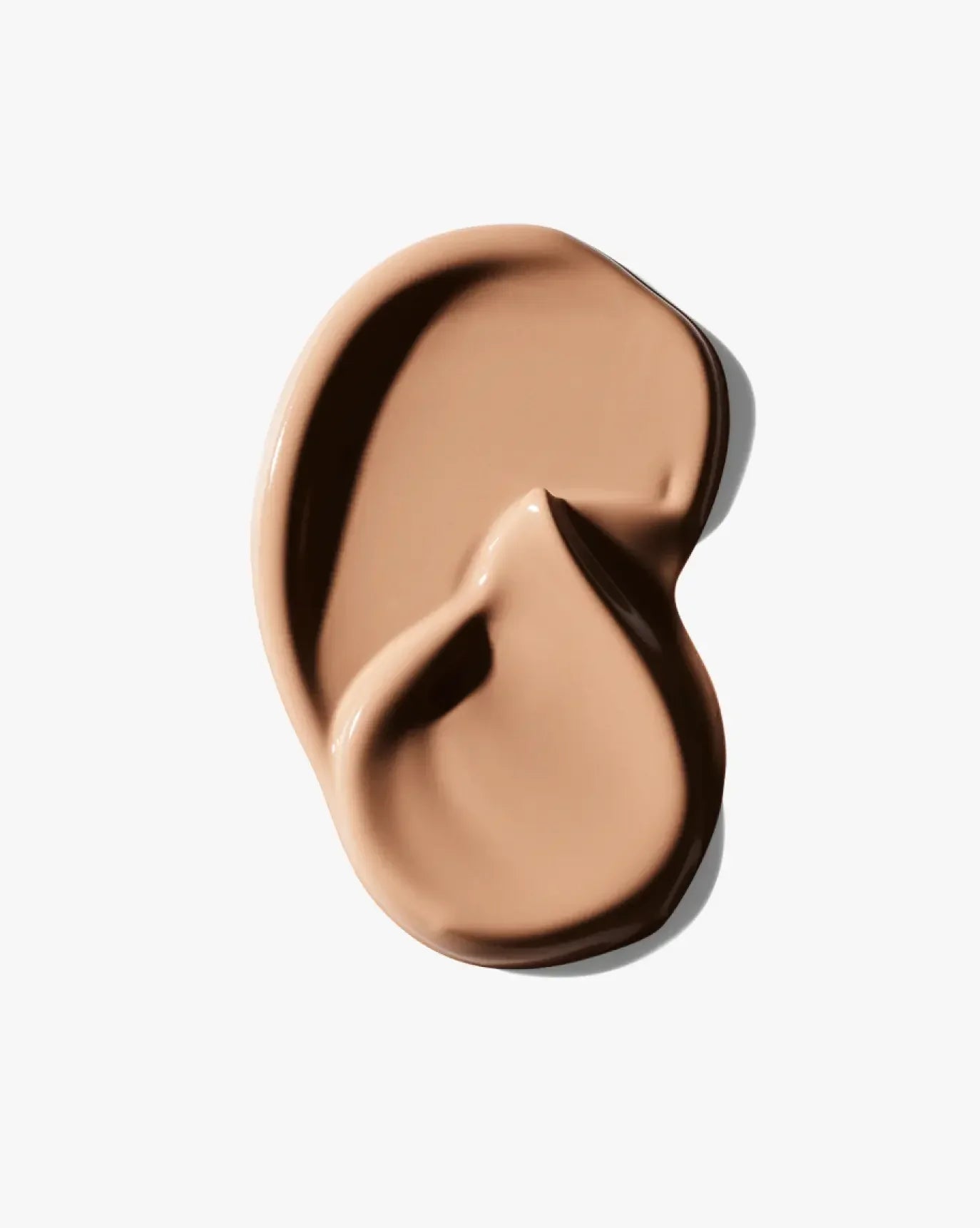 Smooth taupe cream blush with a dewy finish, luxurious soft texture on a white background