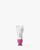 Soft pink cream blush in a sleek tube, featuring a dewy finish and creamy texture