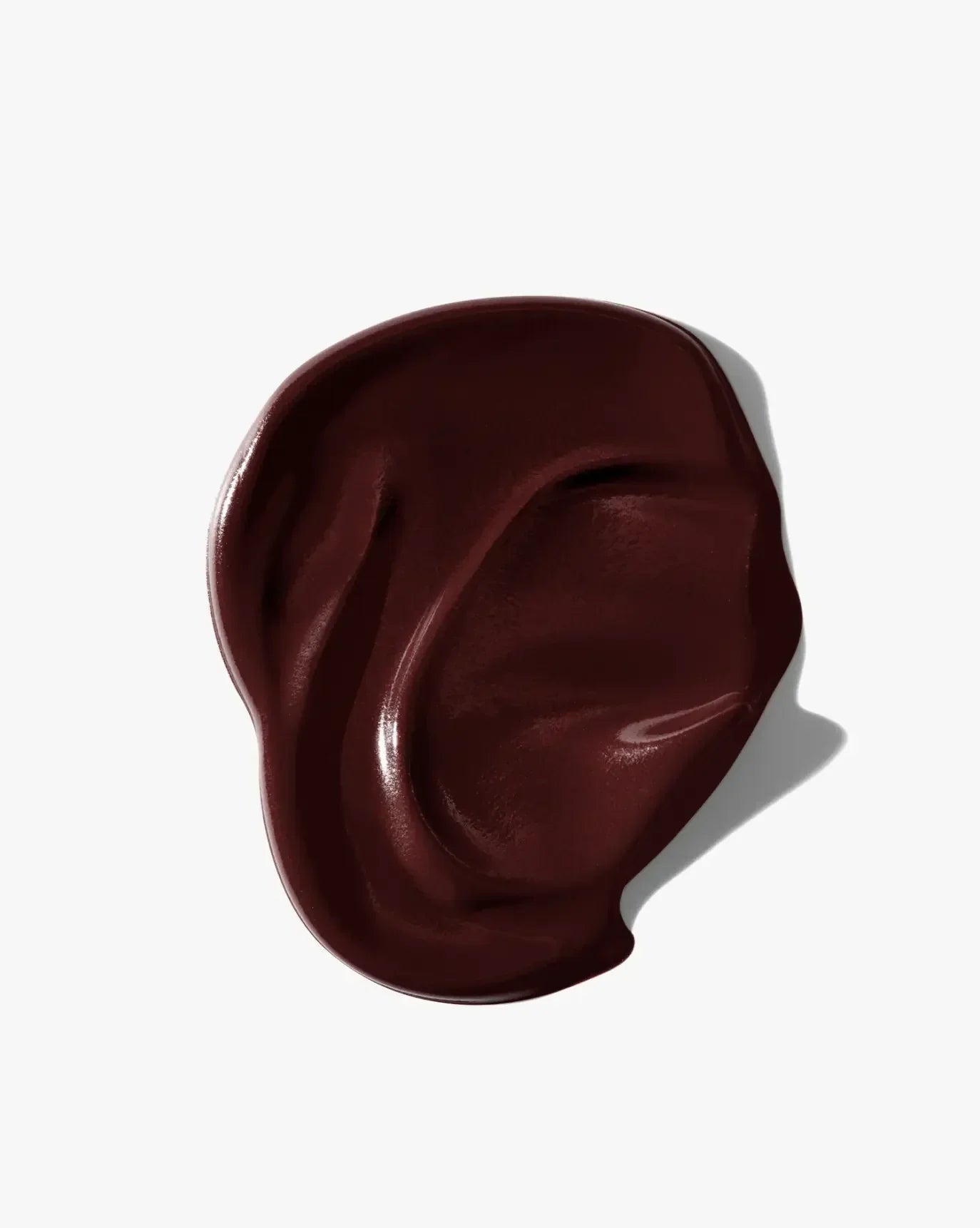 Rich burgundy cream blush swatch with a smooth, dewy texture on a light background