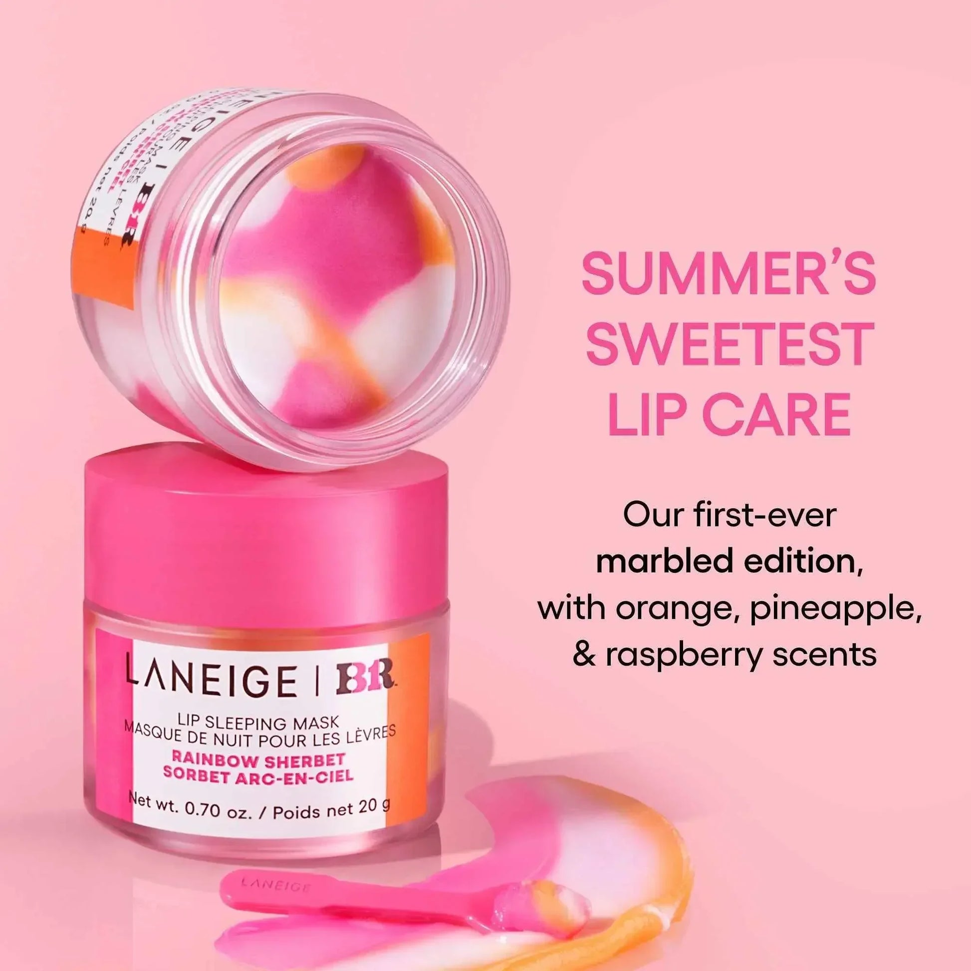 Luxurious marbled lip sleeping mask in pink, orange, and white, creamy texture, with applicator.