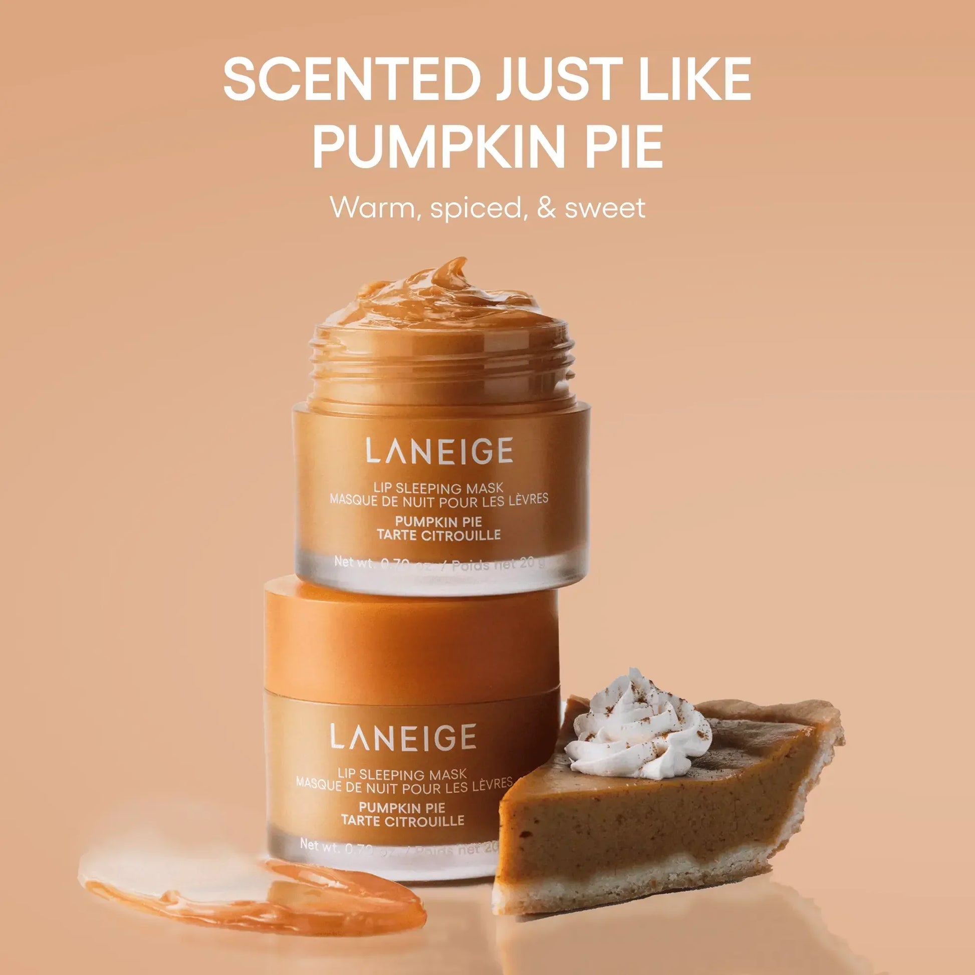 Luxurious pumpkin pie lip sleeping mask with creamy, glossy texture beside pumpkin pie slice.