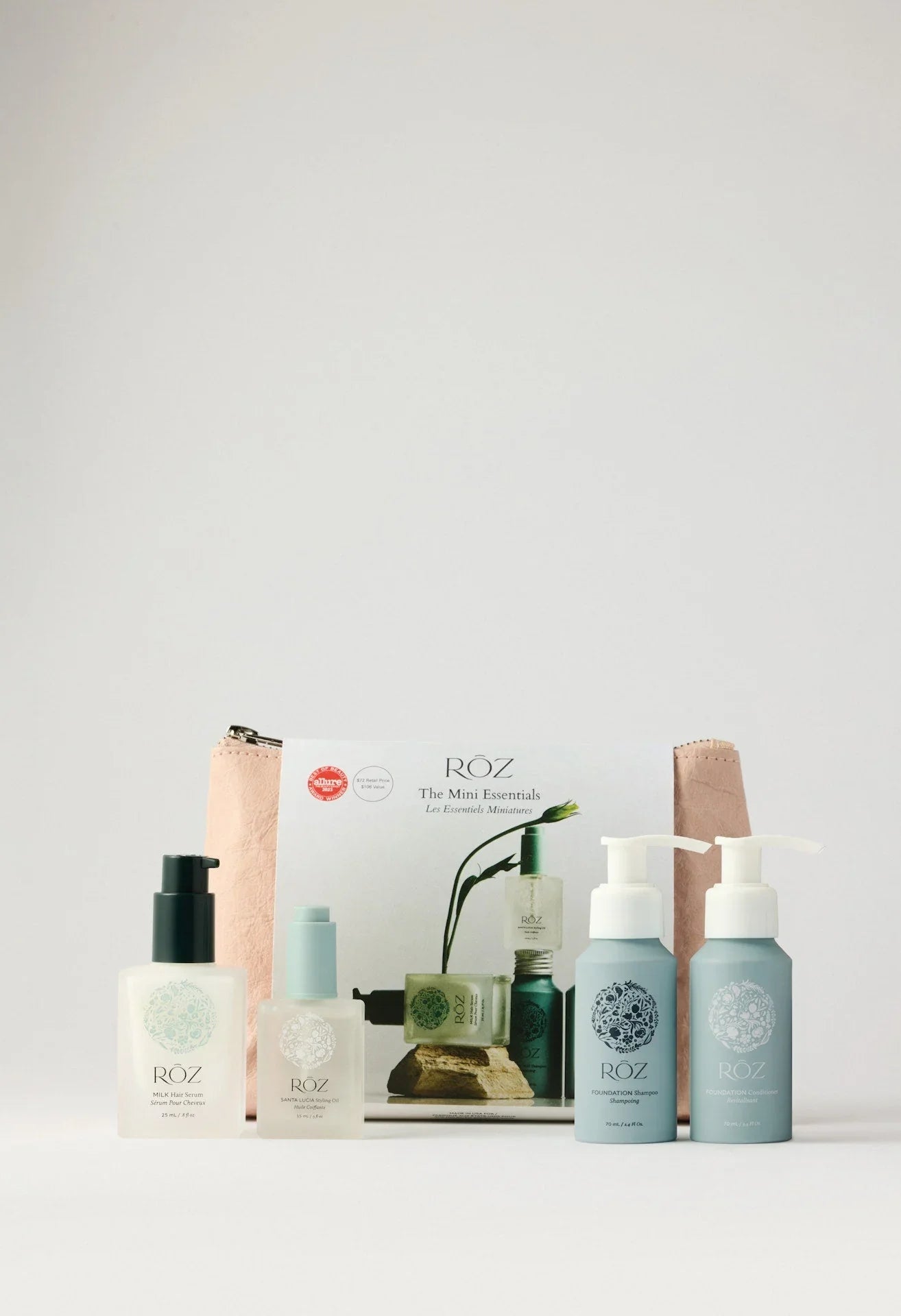 Wylde Grey luxurious mini essentials kit with pump bottles, creamy textures, pastel hues