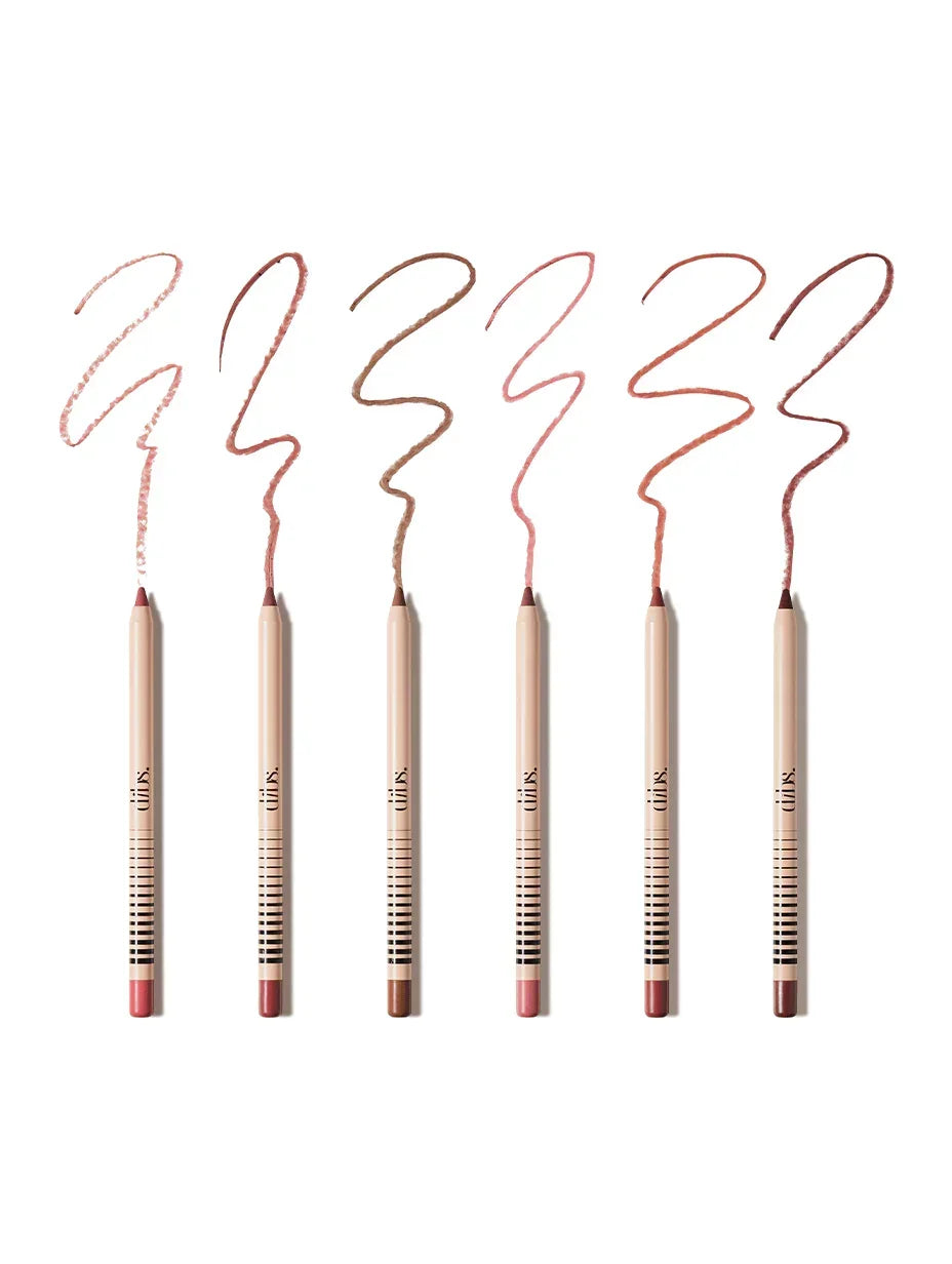 Wylde Grey no pressure lip liners in six creamy nude and pink shades, luxe finish displayed on white