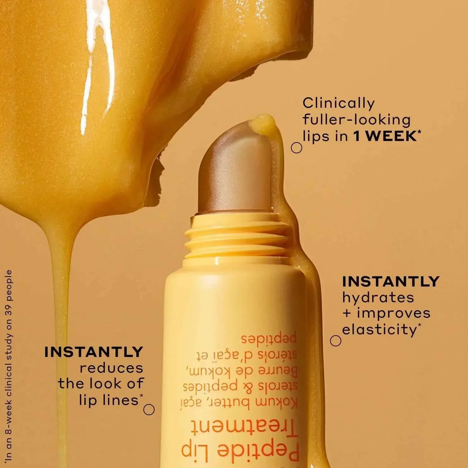 Luxurious golden lip treatment with creamy, glossy texture and sleek applicator on warm background.