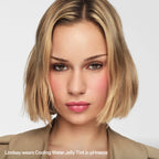 Woman with short blonde hair wearing pink Cooling Water Jelly Tint blush and lip color