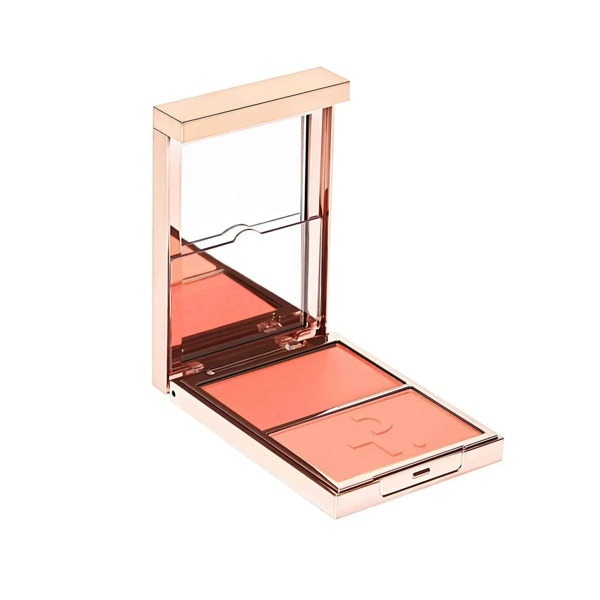 Luxurious blush duo palette with creamy and powder coral shades in a sleek gold compact