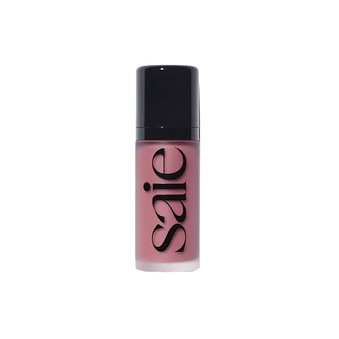 Luxurious mauve liquid blush with dewy finish in sleek frosted bottle, black cap.